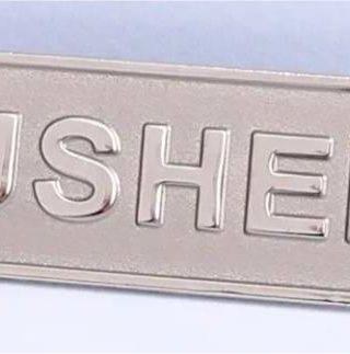 788200806430 Usher Metal Badge